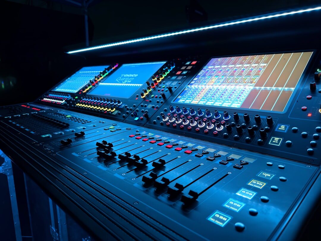 Professional audio mixing console in a broadcast studio